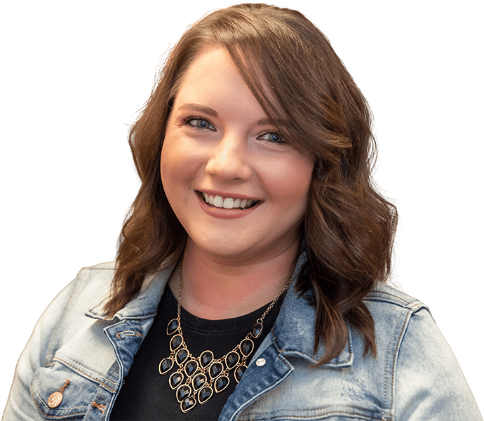 Young woman smiling at the camera.